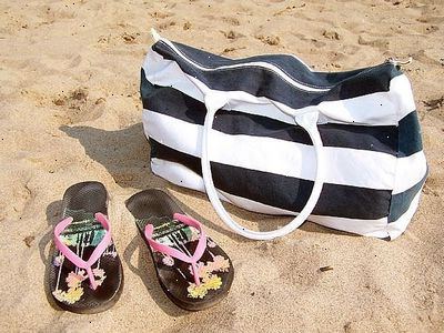 Hvordan til at pakke en strand taske. Køb din strand taske.